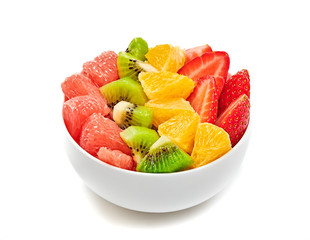 Fruit fresh salad in bowl. Healthy colorful diet salad of fruits strawberry, orange, kiwi, isolated on white. Dieting health meal. Homemade salads concept, clipping path. Full depth of field