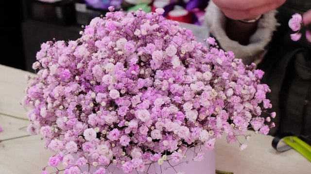 Beautiful pink bouquet in a pink hat box