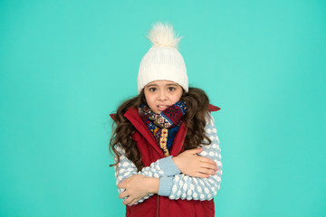 Winter flu. feeling cold this season. Dress in layers and wear hat. Stay active. it is cold outside. kid warm knitwear. winter vibes. Portrait of girl hipster. Youth street fashion. Feeling cozy