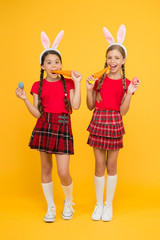 Culture and customs concept. Celebrate Easter with school friends. Easter preparations. Little...
