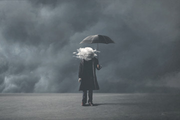 sad surreal businessman with cloud on his head