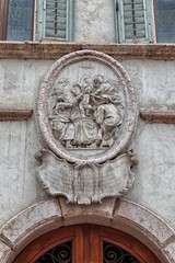 Coat of arms of the martyrdom of beati Simonis. Palazzo Salvadori, Trento, Italy