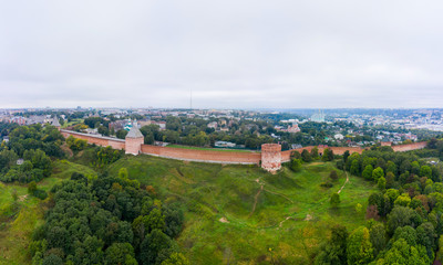 Fototapeta premium Panorama of the western wall of the Smolensk Kremlin and the old part of the city of Smolensk from a flight height on a summer morning, Russia.