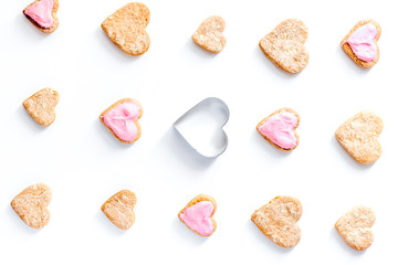 cookies for Valentine Day heartshaped white background top view pattern