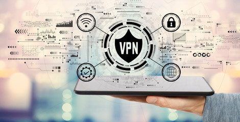 VPN concept with man holding a tablet computer