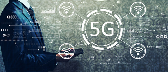 5G network with businessman holding a tablet computer