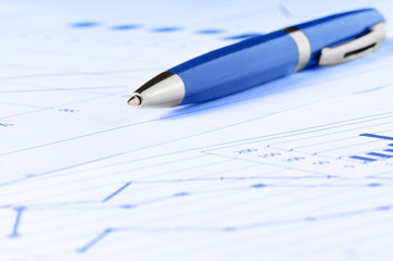 Business analytics, graphs and charts. A schematic drawing on paper. Manager's workplace