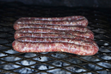 South African boerewors (traditional sausage) being grilled on a braai (Barbeque). 