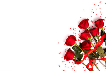 Red fresh roses isolated on white background. Traditional holiday gift.