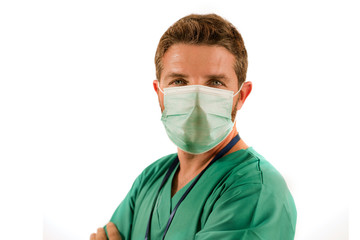 attractive and successful medicine doctor or nurse man posing confident for hospital staff corporate portrait  in green medical uniform and face mask isolated on white