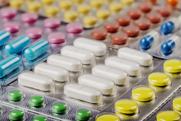 Medications for treatment. Tablets and capsules in blisters