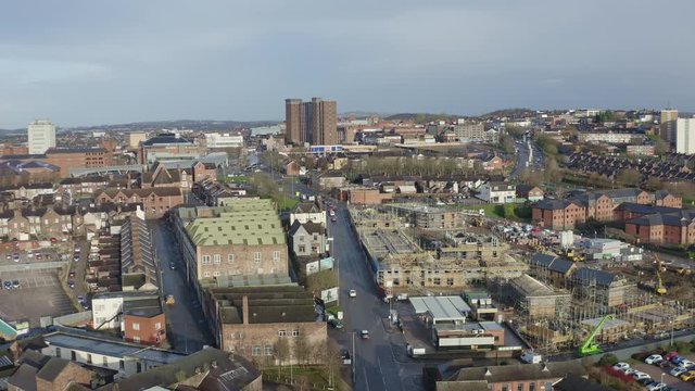 Aerial overhead views of Victoria road in Stoke on Trent, Vicky road, a poor area leading to the city centre of Hanley, always busy with traffic due to over population and poor city planning, traffic