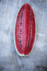 Fototapeta na wymiar watermelon on a wooden background