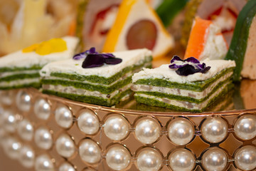  Restaurant cake,white and green layer cake ornate with beads