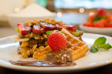 Ready to eat waffle with Strawberry and chocolate- Stock image