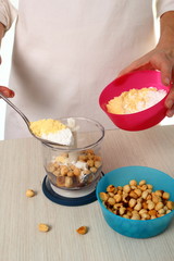 Spoon cornflour and caster sugar into mixer bowl. Making Chocolate Hazelnut Meringue Cake.