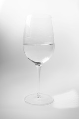 Wineglass with water on white background. Elegance luxury non-alcohol drink