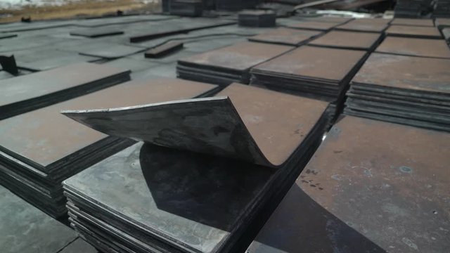 metal lead rectangular plates arranged in a row with a bent corner video 4k