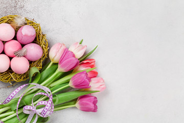 Easter greeting card with eggs and tulips