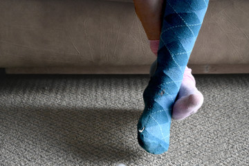 original and nonconformist child with mismatched socks
