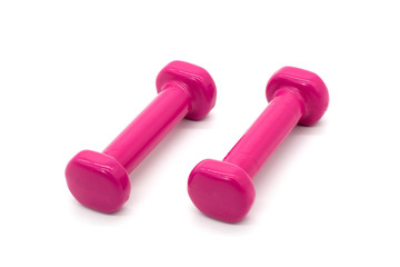 Baby pink dumbbells on a white isolated background