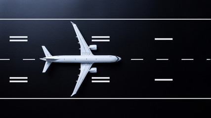 Privat passenger plane fly up over take-off runway from airport on black background. Transport hub