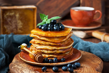 Delicious homemade pancakes   and tea cup