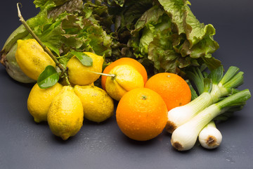 Still life of Lemons and oranges and other vegetables