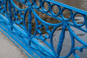 Fragment of an old cast-iron fence of the bridge in St. Petersburg, Russia.