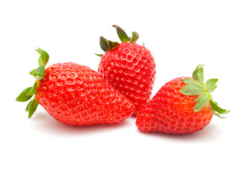 red ripe strawberries on white