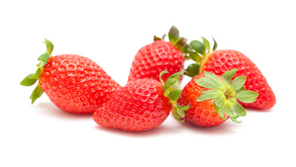 red ripe strawberries on white
