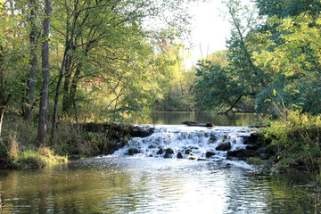 bright sunny reflections brook waterfall