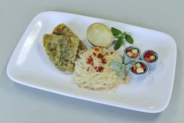 The portrait of food style food served on the white plate