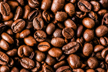 Coffee roasted beans background. Copy space for text.