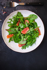 healthy salad leaves mix, salmon or tuna (delicious snack) menu concept. food background. top view. copy space