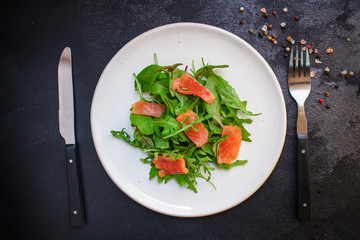 healthy salad leaves mix, salmon or tuna (delicious snack) menu concept. food background. top view. copy space