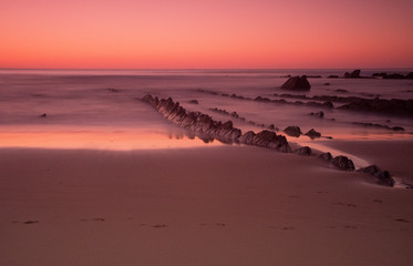 sunset on the beach in barrika, basque country