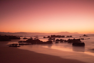 sunset on the beach in barrika, basque country