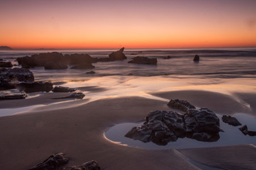 sunset on the beach in barrika, basque country