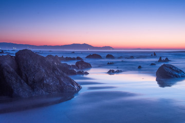 sunset on the beach in barrika, basque country