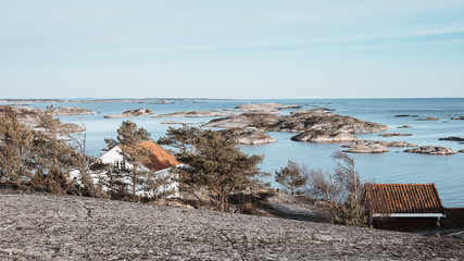Beautiful view of  archipelago  with small summer cottages  dotted along the coast of Southern Norway