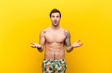  feeling extremely shocked and surprised, anxious and panicking, with a stressed and horrified look