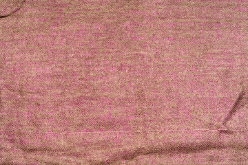 Background of crumpled fabric of pink color