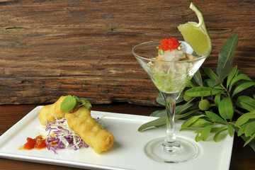 The portrait of food fried food and salad on the plate