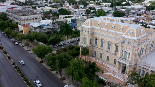 Aerial orbit to the left of the Palacio Canton museum mansion on the Paseo de Montejo in Merida, Yucatan, Mexico.