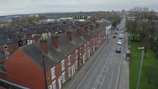 Aerial overhead views of Victoria road, Vicky road, a poor area leading to the city centre of Hanley,  over population and poor city planning, West Midlands