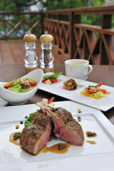 The portrait of food steak on the white plate
