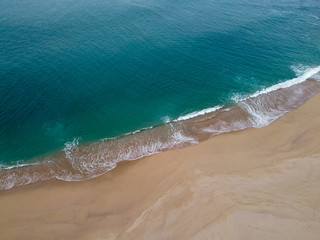 Waves breaking in a beach