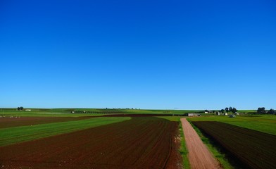 Bright landscape of Morocco, breathtaking curves of mountains, stunning combination of hills & farm land,inadvertent distribution of houses & huts, raw impression of pure nature.