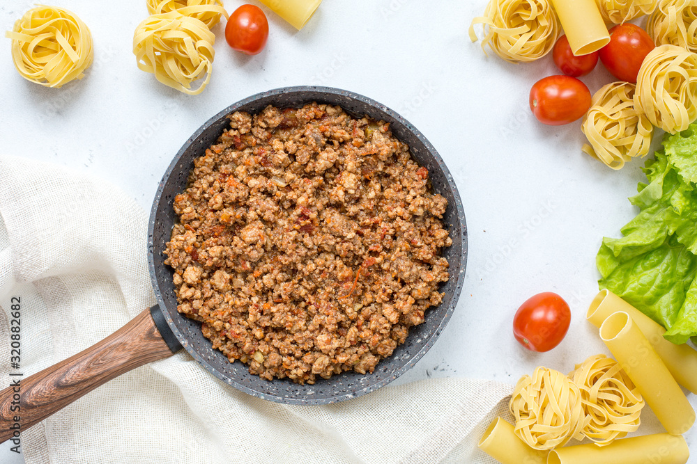 Canvas Prints Hot pan with meat ragu for pasta - Bolognese sauce. Homemade, traditional recipe. Italian food.